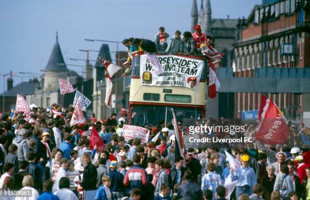 Liverpool FC celebrate being the FA Cup and Canon League Division One champions, and parade the trophies in an open top bus down the Scotland Road on...