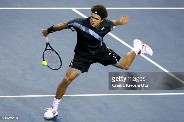 Jo-Wilfried Tsonga of France returns a shot in his match against Mischa Zverev of Germany during day three of the Rakuten Open Tennis tournament at...