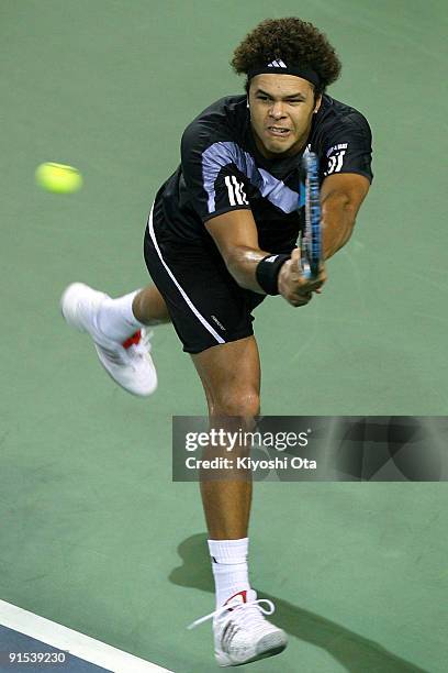 Jo-Wilfried Tsonga of France returns a shot in his match against Mischa Zverev of Germany during day three of the Rakuten Open Tennis tournament at...