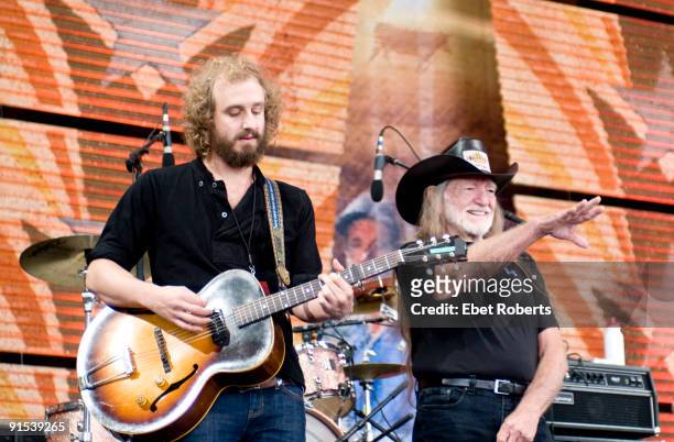 Matthew Houck of Phosphorescent and Willie Nelson onstage at Farm Aid 2009 held at Verizon Wireless Amphitheatre on October 4, 2009 in Maryland...