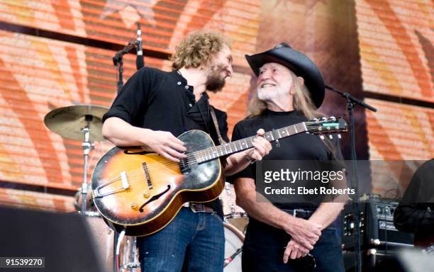 Matthew Houck of Phosphorescent and Willie Nelson onstage at Farm Aid 2009 held at Verizon Wireless Amphitheatre on October 4, 2009 in Maryland...
