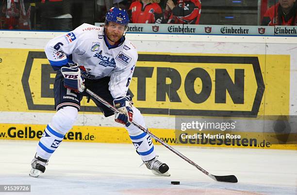 Sven Butenschoen of Mannheim skates with the puck during the DEL match between Hannover Scorpions and Adler Mannheim at the TUI Arena on October 6,...