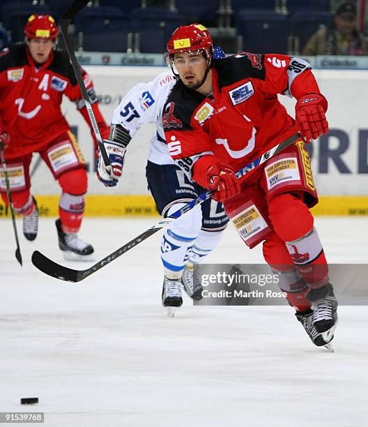 Peter Baumgartner of Hannover skates with the puck during the DEL match between Hannover Scorpions and Adler Mannheim at the TUI Arena on October 6,...