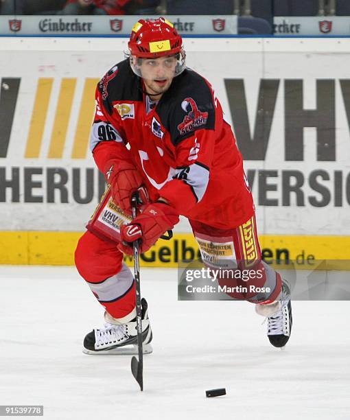 Andre Reiss of Hannover skates with the puck during the DEL match between Hannover Scorpions and Adler Mannheim at the TUI Arena on October 6, 2009...