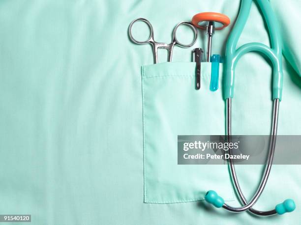 doctors pockets with medical instruments. - stethoscope stock pictures, royalty-free photos & images