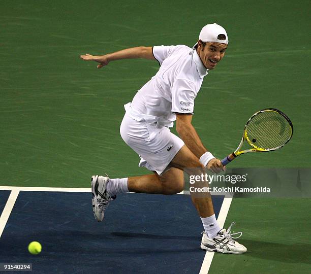 Richard Gasquet of France returns a shot in his match against Philipp Petzschner of Germany during day three of the Rakuten Open Tennis tournament at...