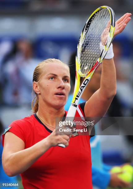 Svetlana Kuznetsova of Russia celebrates winning against Alona Bondarenko of Ukraine in her third round match during day six of the 2009 China Open...