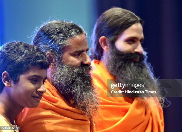 Naman Jain , Swami Baba Ramdev and Kranti Prakash Jha during a press conference to announce the mega show, 'Swami Ramdev: Ek Sangharsh' on Discovery...