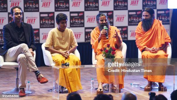 Karan Bajaj , Senior VP& GM, Discovery Communications India, Naman Jain , Swami Baba Ramdev and Kranti Prakash Jha at the press conference to...