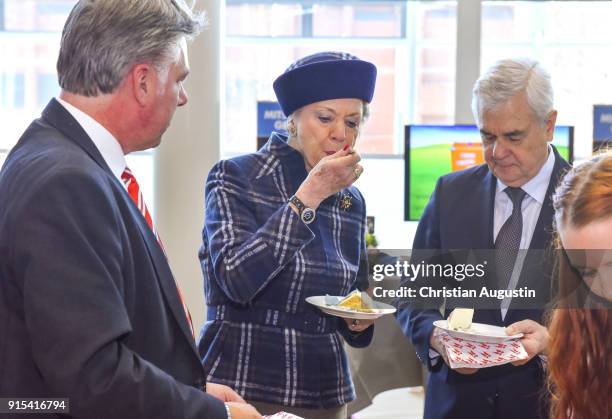 Princess Benedikte of Denmark and Senator Frank Horch taste some cake during the walkabout of HAMBURG REISEN at Hamburg Messe on February 7, 2018 in...