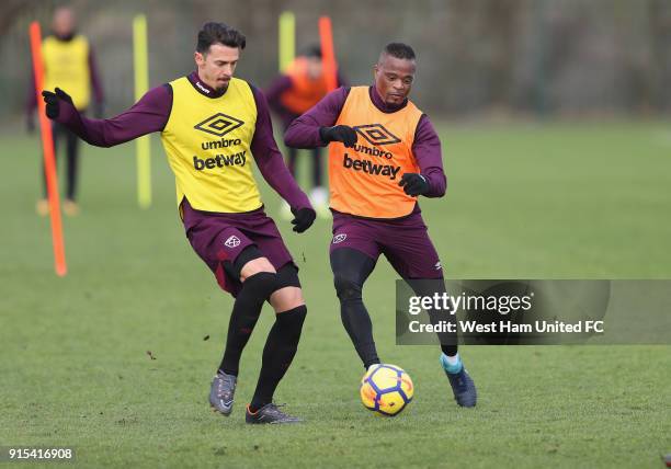 New signing Patrice Evra with Jose Fonte in training as West Ham United Unveil New Signing Patrice Evra at Rush Green on February 7, 2018 in Romford,...