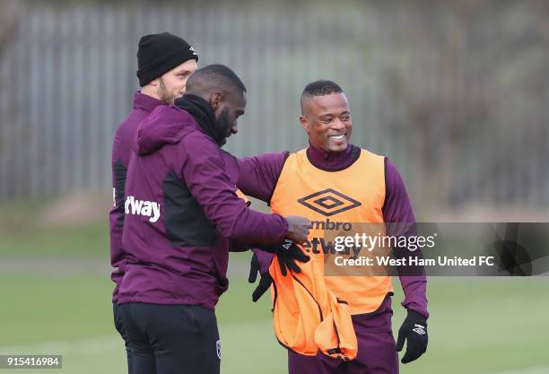 New signing Patrice Evra with Marko Arnautovic in training as West Ham United Unveil New Signing Patrice Evra at Rush Green on February 7, 2018 in...