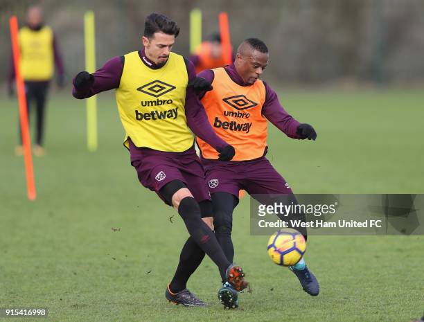 New signing Patrice Evra with Jose Fonte in training as West Ham United Unveil New Signing Patrice Evra at Rush Green on February 7, 2018 in Romford,...