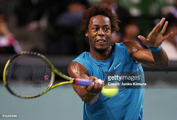 Gael Monfils of France plays a forehand in his match against Marco Chiudinelli of Switzerland during day three of the Rakuten Open Tennis tournament...