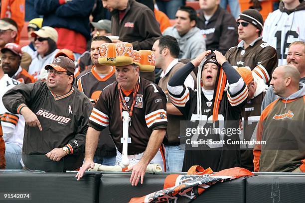 Cleveland Browns fans react in disgust to a penalty call during the game against the Cincinnati Bengals at Cleveland Browns Stadium on October 4,...