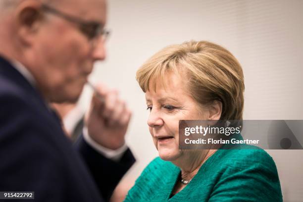 German Chancellor Angela Merkel and Volker Kauder , leader of the CDU/CSU Bundestag faction in the course of a special faction meeting, on February...