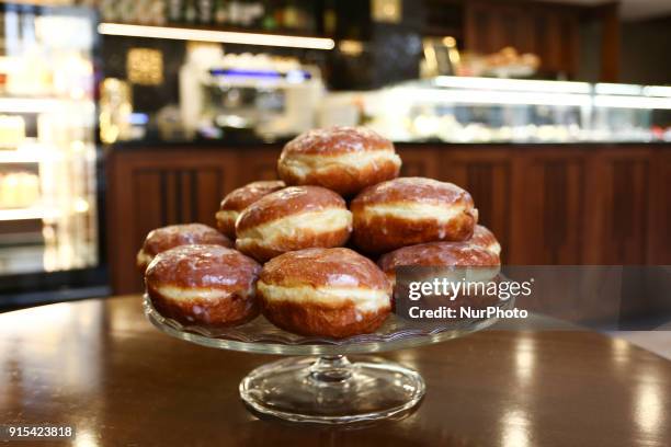 Krakow's well-known bakery 'Cichowscy' produces donuts for Fat Thursday. Fat Thursday is a traditional Catholic Christian feast on the last Thursday...