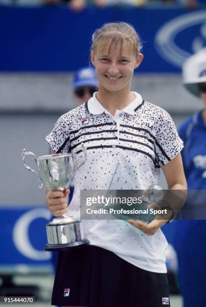 Mirjana Lucic of Croatia poses with the trophy after defeating Marlene Weingartner of Germany in the Girls' Singles Final of the Australian Open...