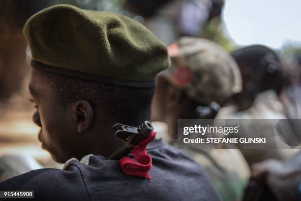 Newly released child soldiers attend sit as they attend their release ceremony in Yambio, South Sudan, on February 7, 2018. More than 300 child...