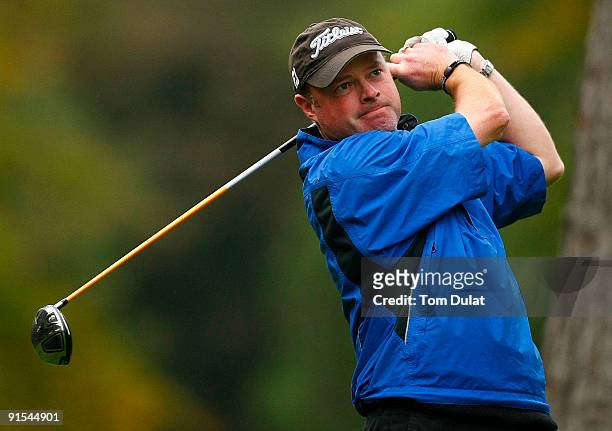 Adrian Ambler tees off from the 18th hole during the SkyCaddie PGA Fourball Championship at Forest Pines Golf Club on October 7, 2009 in Broughton,...