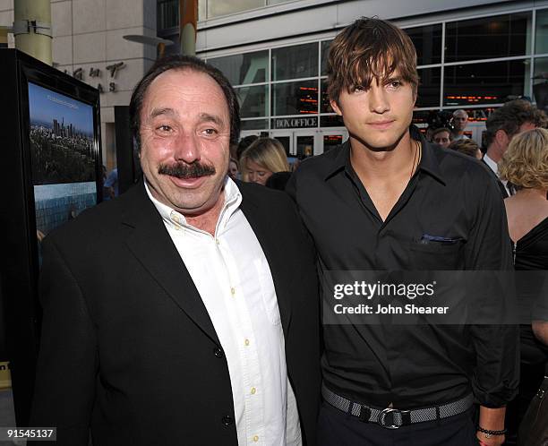 Anchor Bay's Bill Clark and actor Ashton Kutcher arrive on the red carpet of the Los Angeles premiere of "Spread" at the ArcLight Hollywood on August...