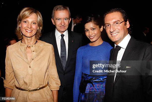 Helene Arnault, Bernard Arnaud, Freida Pinto and Pietro Beccari attends Louis Vuitton Pret a Porter show as part of the Paris Womenswear Fashion Week...