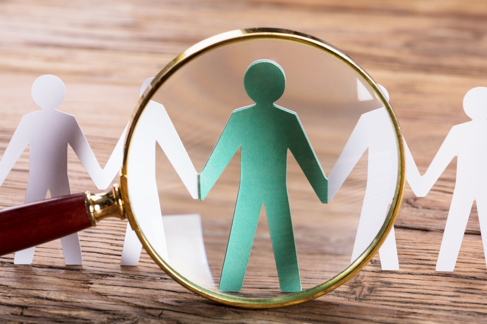Magnifying Glass On Cut-out Figures Magnifying Glass On Cut-out Figures