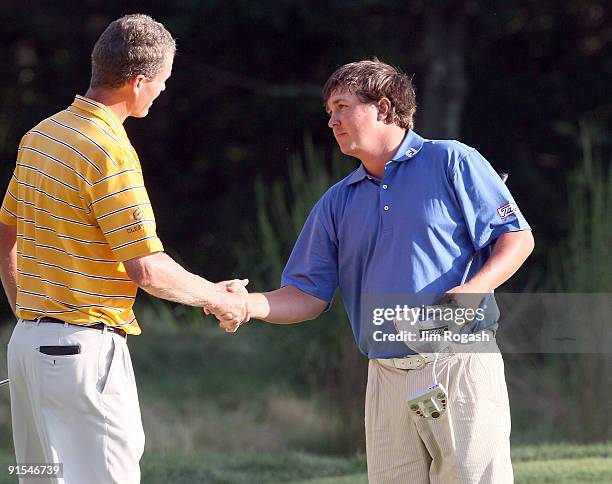 John Seden and Jason Dufner shake hands during the final round of the Deutsche Bank Championship held at TPC Boston on September 7, 2009 in Norton,...