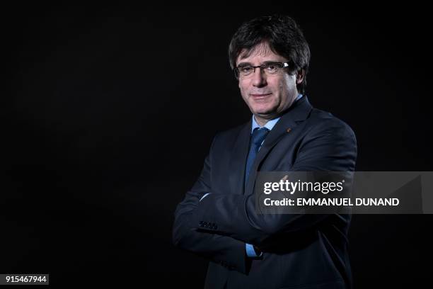 Exiled former Catalan leader Carles Puigdemont poses during a photo session in Brussels on February 7, 2018.