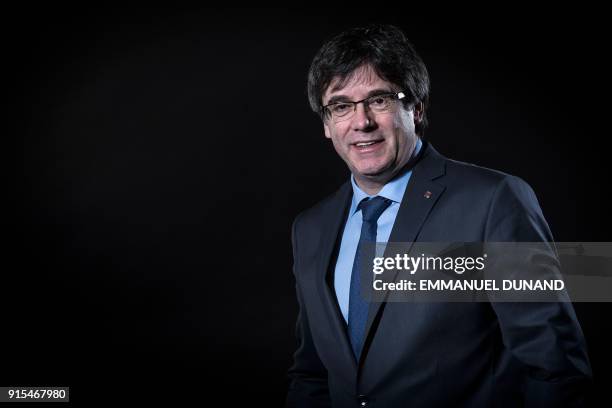 Exiled former Catalan leader Carles Puigdemont poses during a photo session in Brussels on February 7, 2018.
