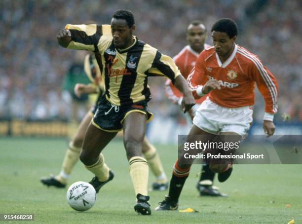Paul Ince of Manchester United tracks Andy Gray of Crystal Palace during the FA Cup Final replay at Wembley Stadum on May 17, 1990 in London,...