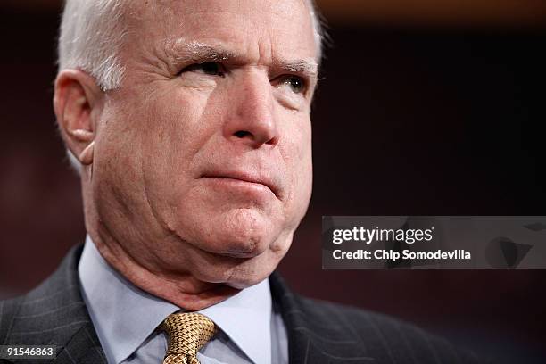 Senate Armed Services Committee ranking member Sen. John McCain attends a news conference about the 2010 defense authorization bill at the U.S....