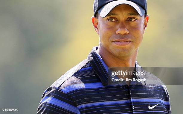 Tiger Woods looks on during Round One of the 2009 Deutsche Bank Championship In Norton, Massachusetts on September 5, 2009 in Boston, Massachusetts.