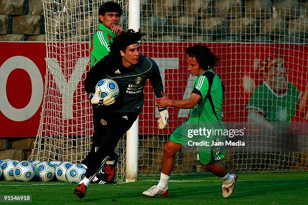 Mexico's goalkeeper Guillermo Ochoa and Andres Guardado during their training session at the Mexican Football Federation's High Performance Center on...