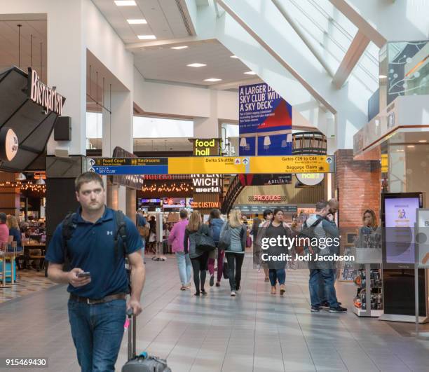 inside airline terminal at laguardia airport in new york - laguardia airport stock pictures, royalty-free photos & images