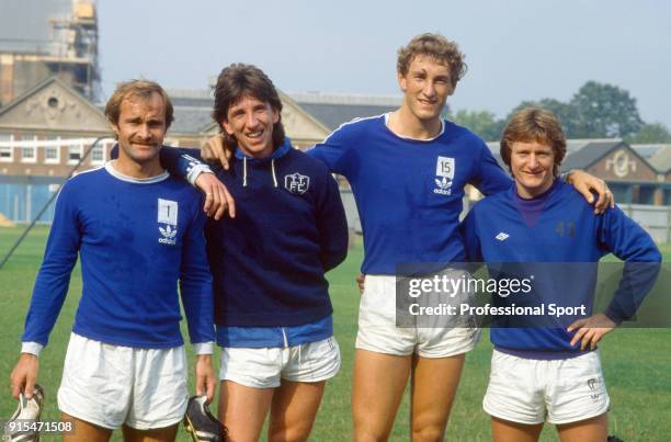 Ipswich Town footballers Mick Mills, Paul Mariner, Terry Butcher and Eric Gates line up for a photo during training, circa 1980.