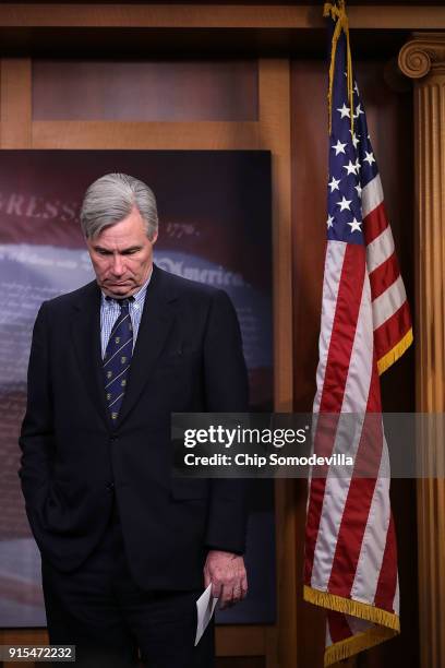 Sen. Sheldon Whitehouse joins fellow Democrats in criticizing the Tax Cuts and Jobs Act during a news conference at the U.S. Capitol February 7, 2018...