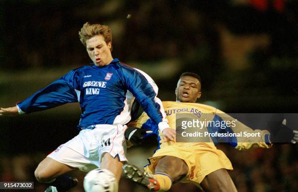 Martijn Reuser of Ipswich and Marcel Desailly of Chelsea battle for the ball during an FA Carling Premiership match at Portman Road on December 26,...