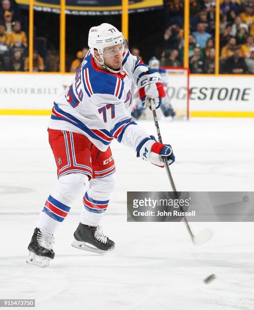 Tony DeAngelo of the New York Rangers shoots the puck against the Nashville Predators during an NHL game at Bridgestone Arena on February 3, 2018 in...