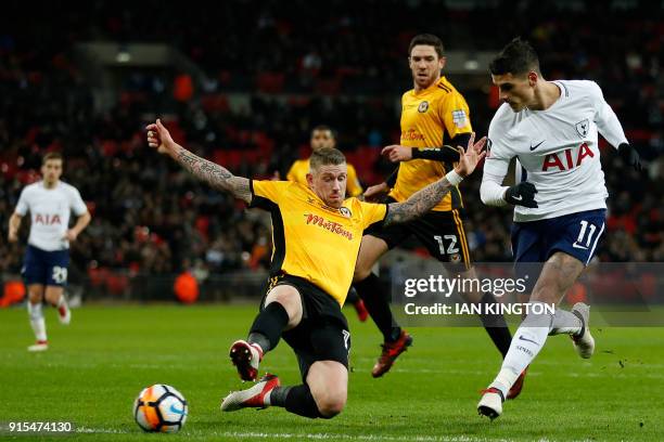 Tottenham Hotspur's Argentinian midfielder Erik Lamela shoots to score their second goal during the English FA Cup fourth round replay football match...