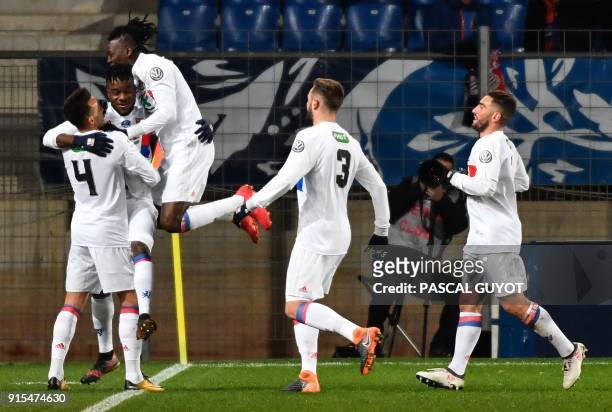 Lyon's French forward Maxwel Cornet celebrates with his teammates after scoring a goal during the French Cup football match between Montpellier and...