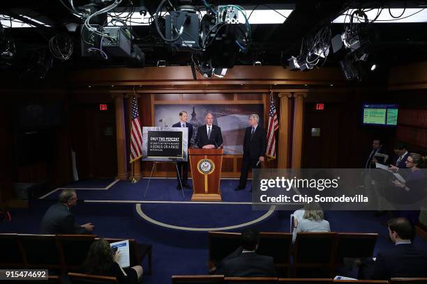 Sen. Ron Wyden , Sen. Robert Casey and Sen. Sheldon Whitehouse criticize the Tax Cuts and Jobs Act during a news conference at the U.S. Capitol...