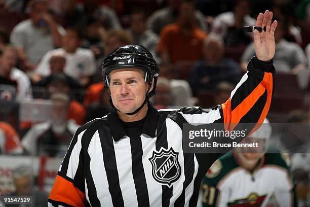Referee Kerry Fraser looks on during a line change in the preseason NHL game between the Philadelphia Flyers and the Minnesota Wild at the Wachovia...