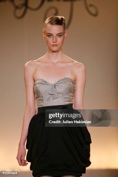 Model walks the runway during the Collette Dinnigan Pret a Porter show as part of the Paris Womenswear Fashion Week Spring/Summer 2010 at Hotel...