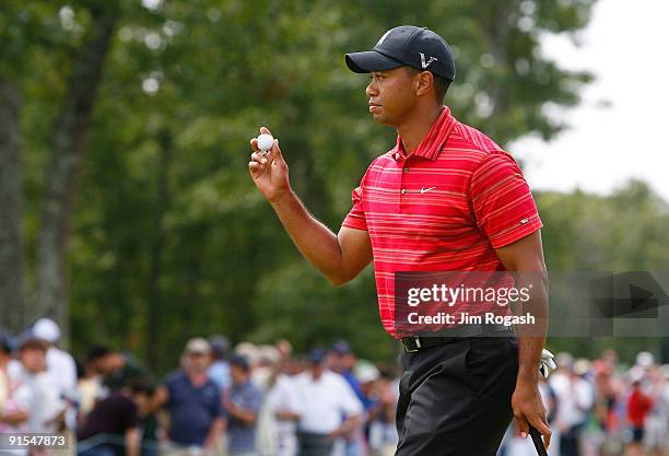 Tiger Woods waves his ball during the final round of the Deutsche Bank Championship held at TPC Boston on September 7, 2009 in Norton, Massachusetts.