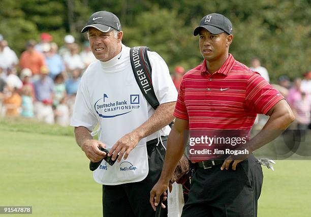 Steve Williams and Tiger Woods look on during the final round of the Deutsche Bank Championship held at TPC Boston on September 7, 2009 in Norton,...