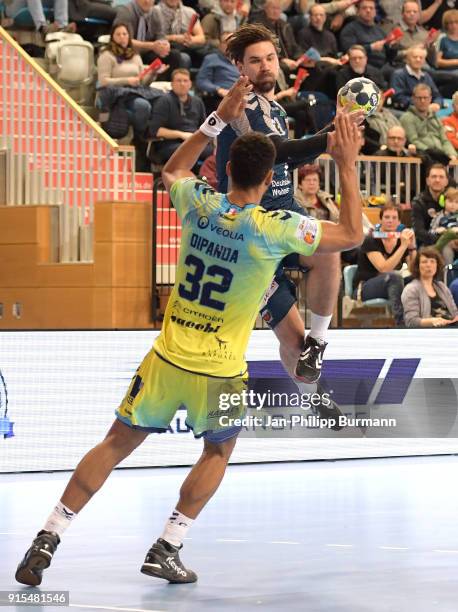 Adrien Dipanda of Saint-Raphael VHB and Fabian Wiede of Fuechse Berlin during the EHF-Cup game between Fuechse Berlin and Saint-Raphael VHB at MBS...