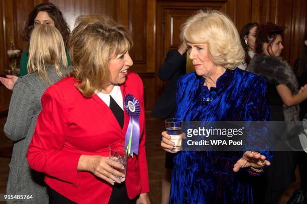Camilla, Duchess of Cornwall with co-founder of Women in Journalism Eve Pollard during a reception for Women in Journalism at The Ned on February 7,...