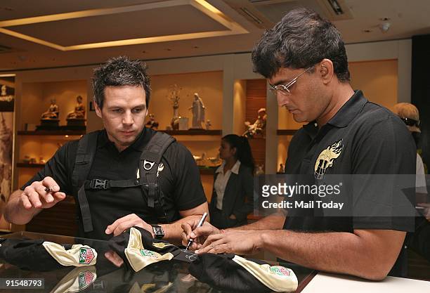 Kolkata Knight Riders' team members Saurav Ganguly and Brad Hodge at the inauguration of Tag Heuer's new boutique in New Delhi on October 6, 2009.