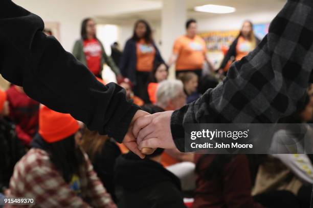 Immigration activists reherse civil disobediance ahead of a protest on February 7, 2018 in Washington D.C. A coalition of activists came from across...